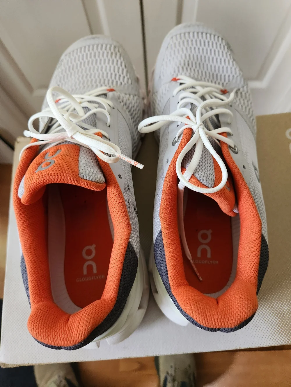 On Running Men’s White and Orange Cloudswift Running Shoes
